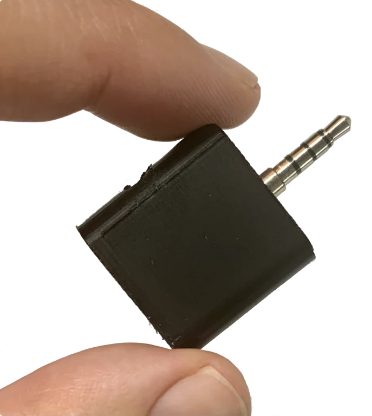 RECAP S2 adapter held between two fingers